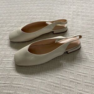 Pazzion cream slingback kitten heels.